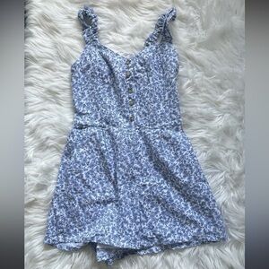 Blue floral buttoned romper